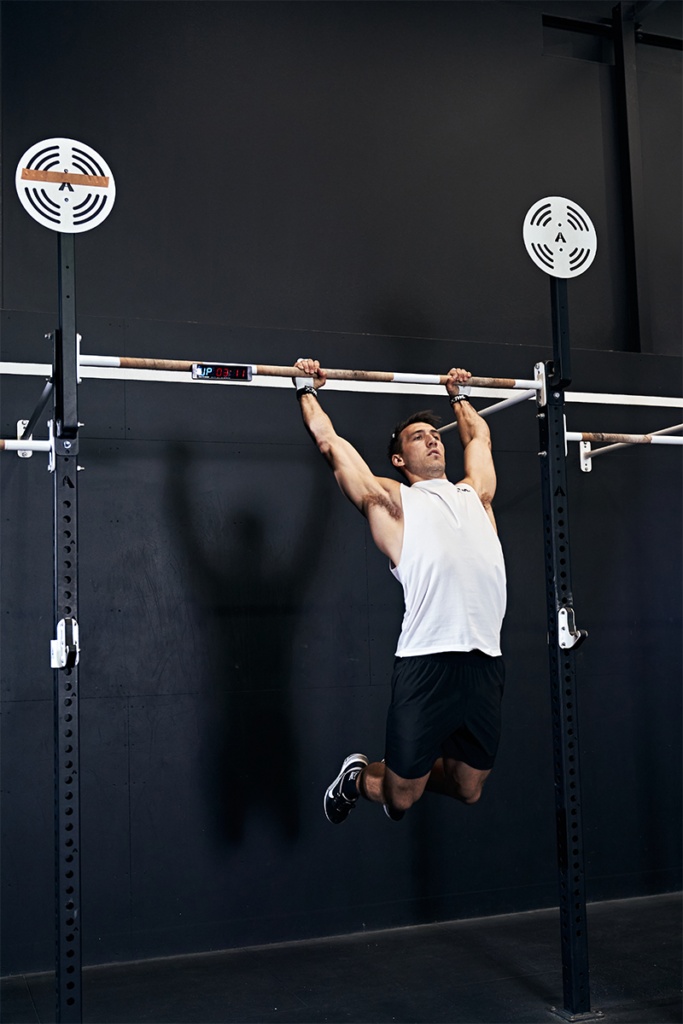 athlete performing butterfly pull-ups during the Open
