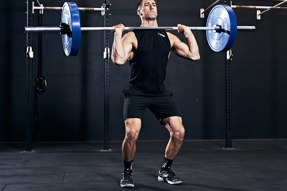 man doing clean and jerk wod