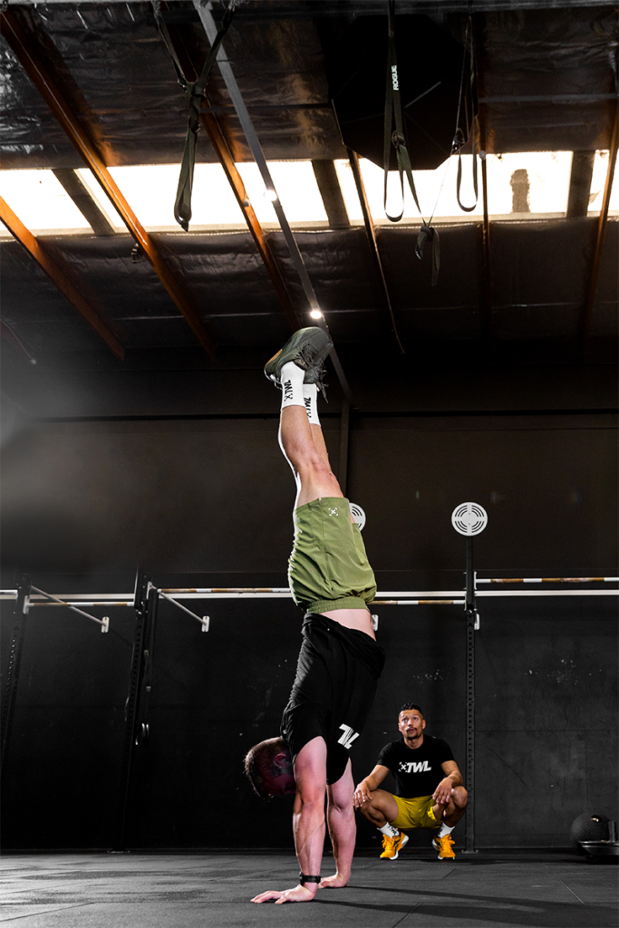 athlete practicing handstands for beginners